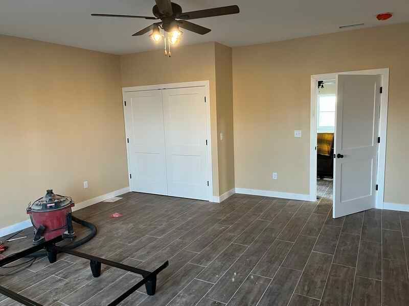 There is a vacuum cleaner in the middle of the room.