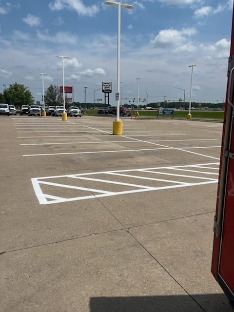 A parking lot with a sign that says delta on it