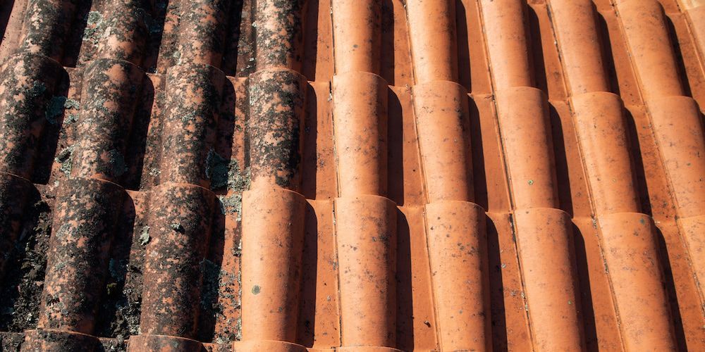 Close-up of a Terracotta Tile Roof With Corrosion