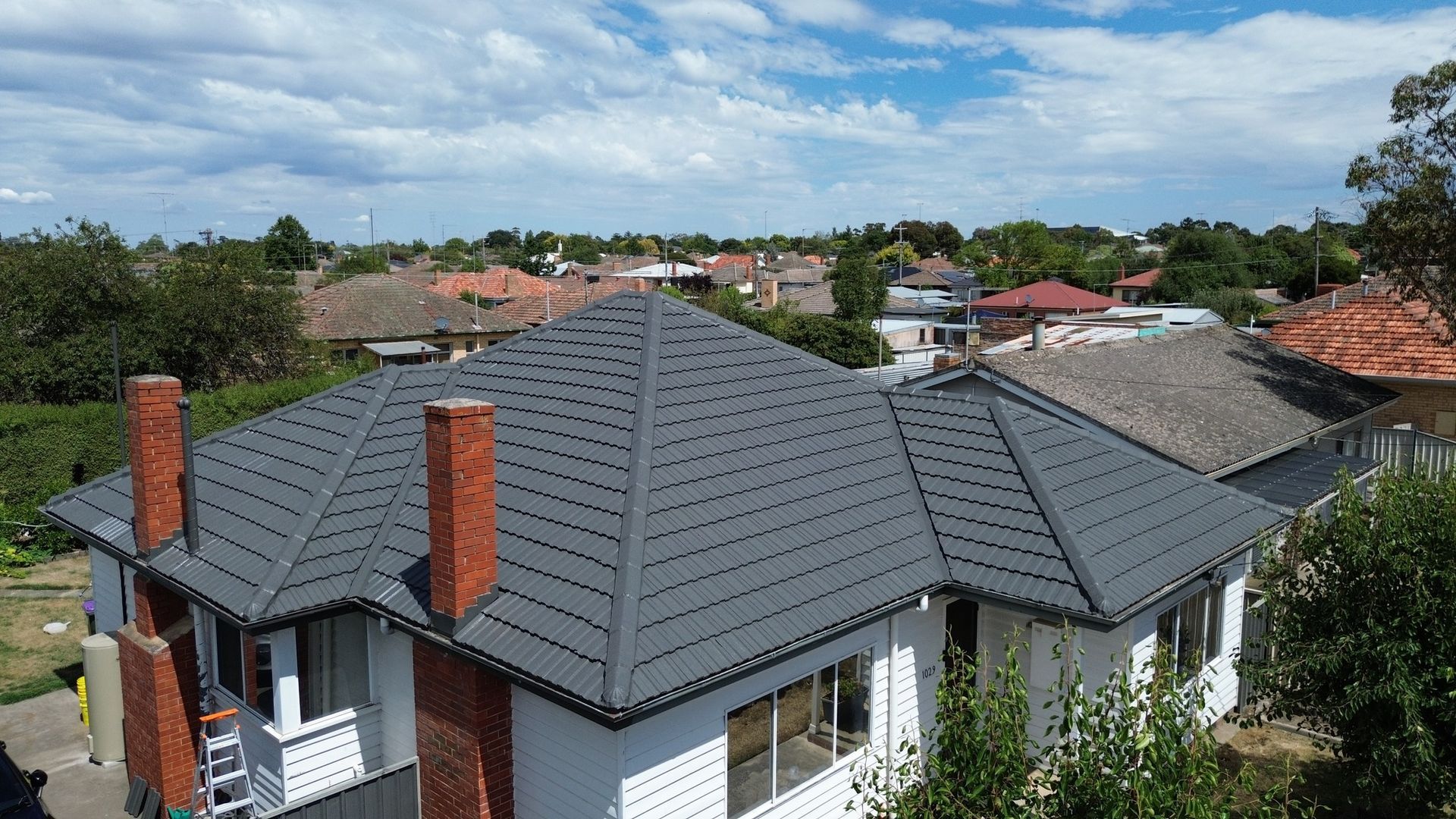 New Dark Grey Roof Featuring Modern Drainage
