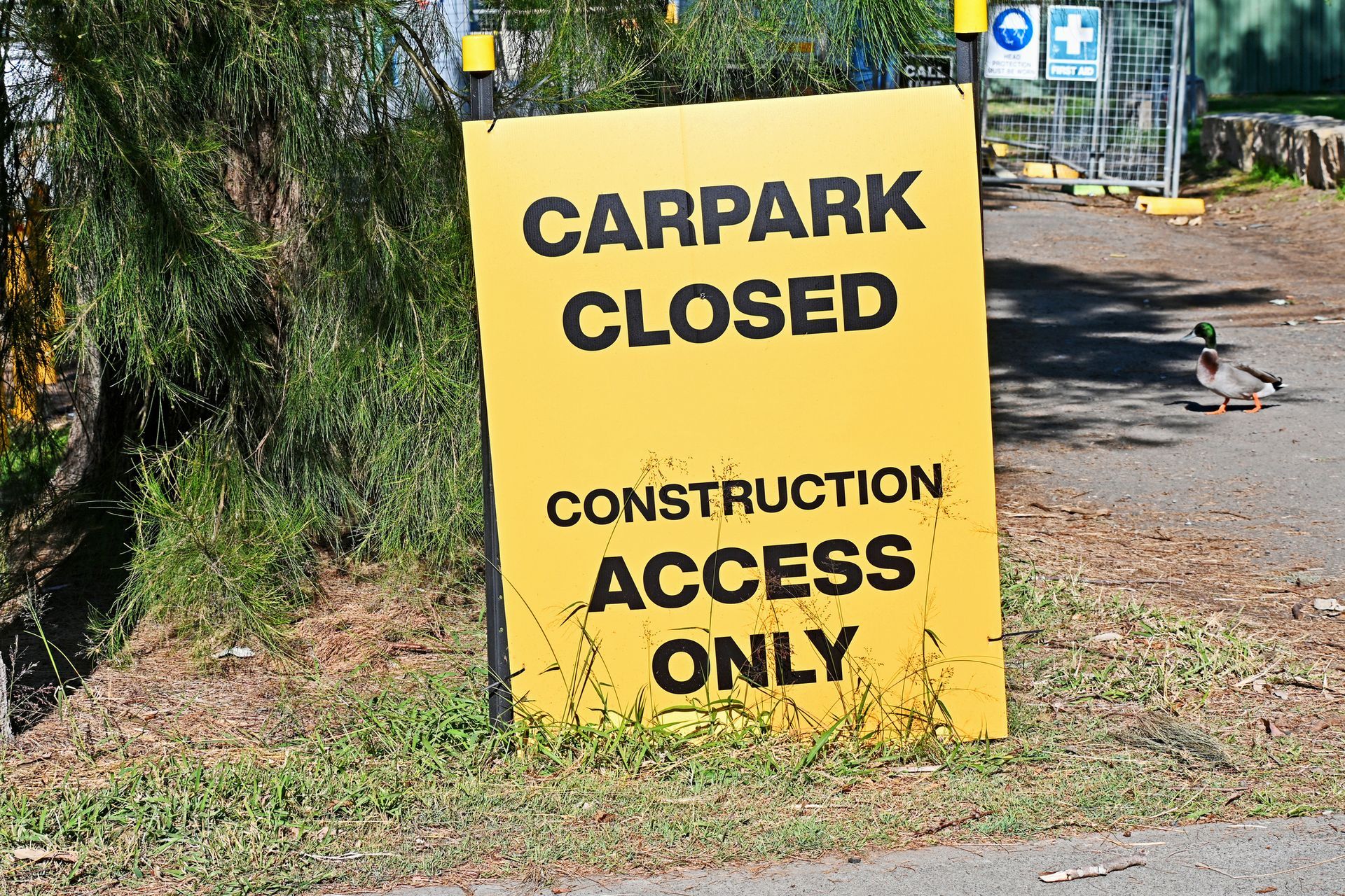 A yellow sign that says carpark closed construction access only