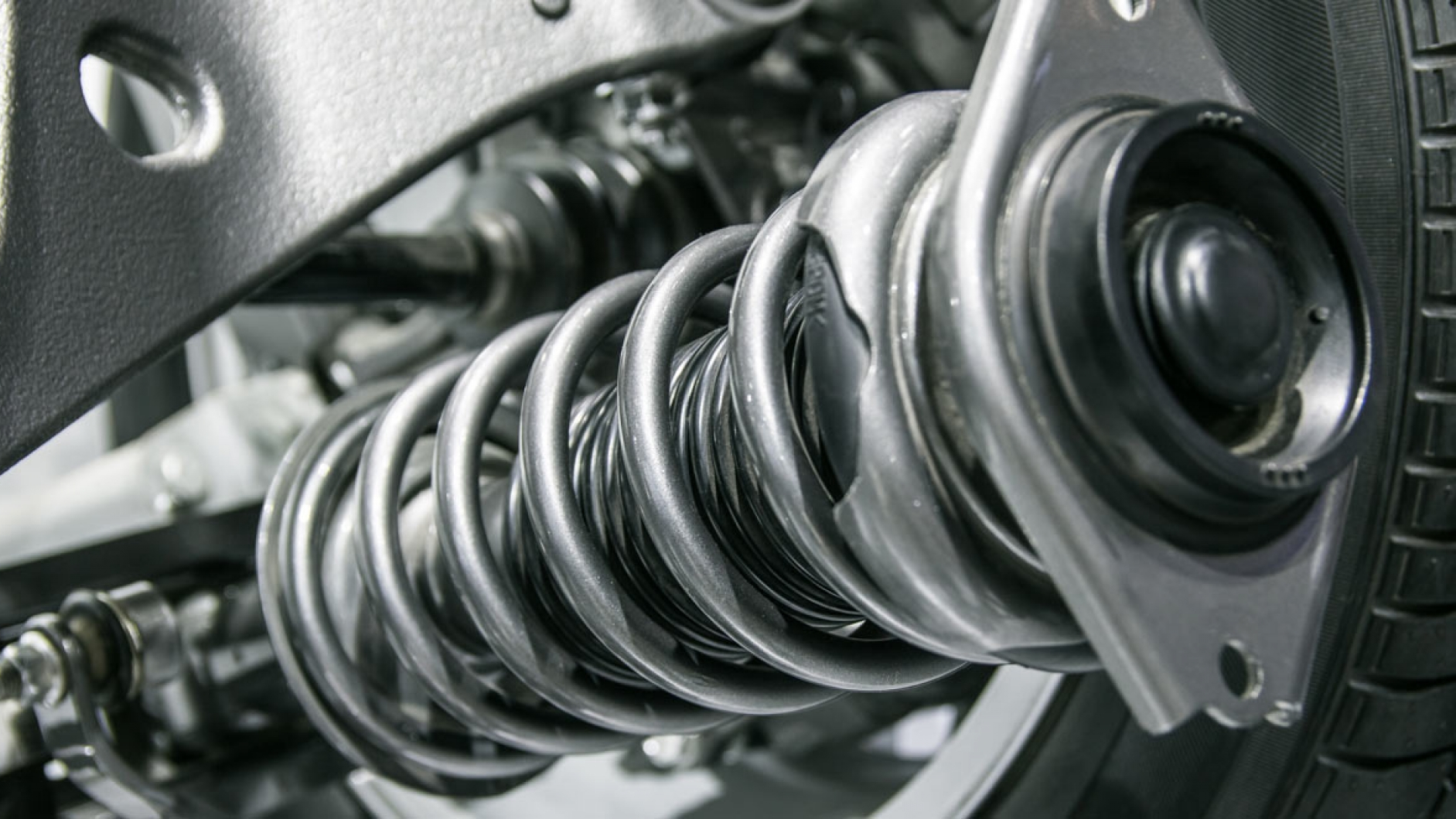 a close up of a coil spring on a car