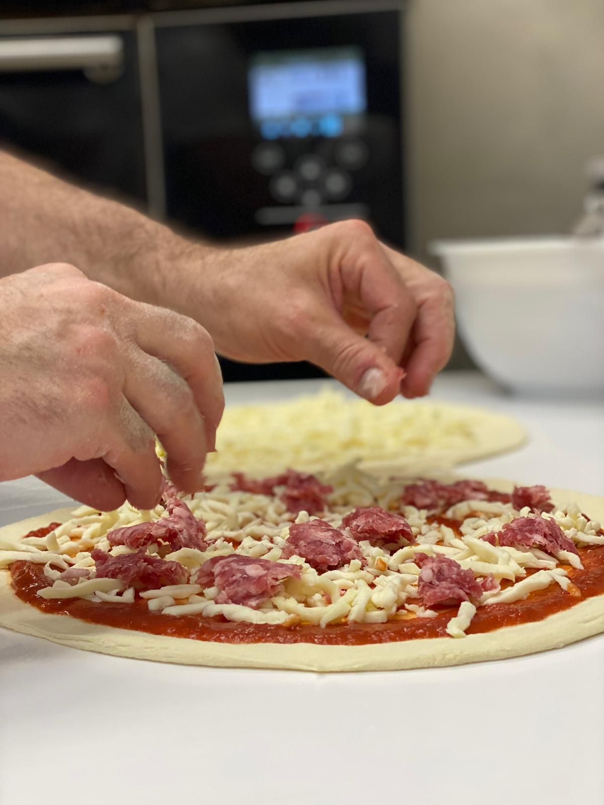 PREPRAZIONE DELLA PIZZA