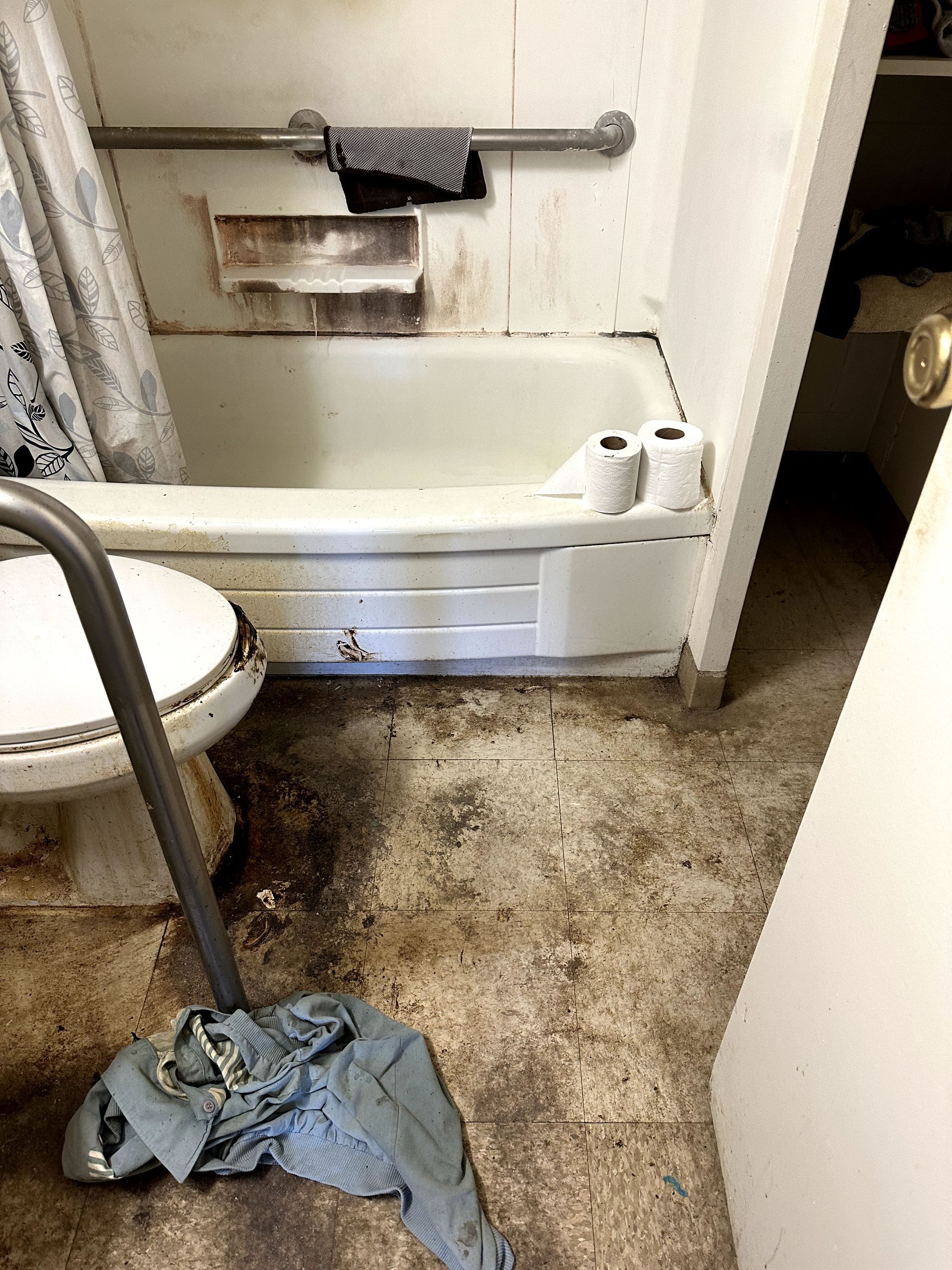 A before shot of a bathroom in a hoard cleanup in Pittsburgh, PA by Kingdom Bio Recovery & Restoration