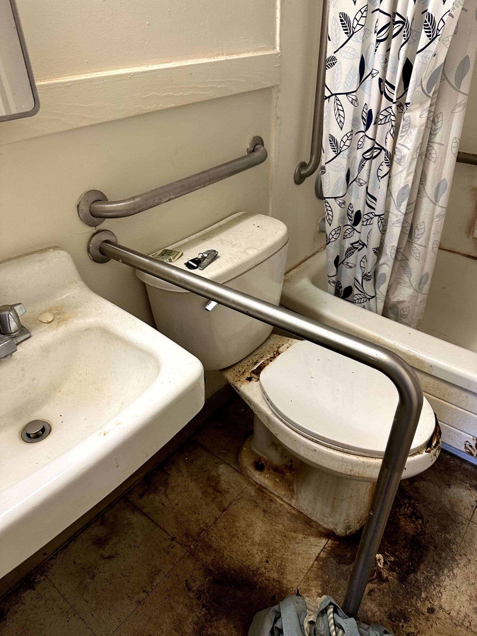 A before shot of a bathroom in a hoard cleanup in Pittsburgh, PA by Kingdom Bio Recovery & Restoration