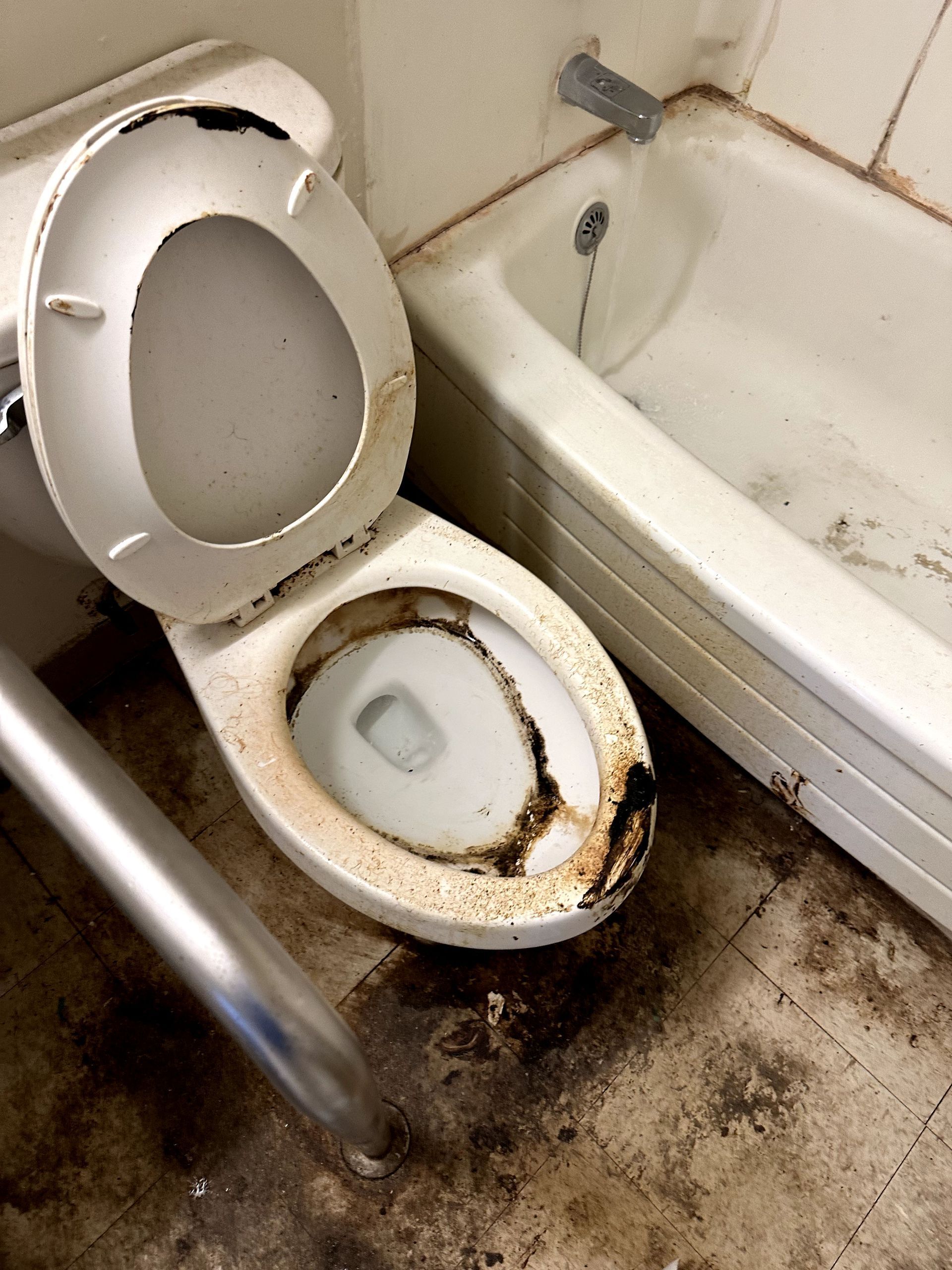 A before shot of a bathroom in a hoard cleanup in Pittsburgh, PA by Kingdom Bio Recovery & Restoration