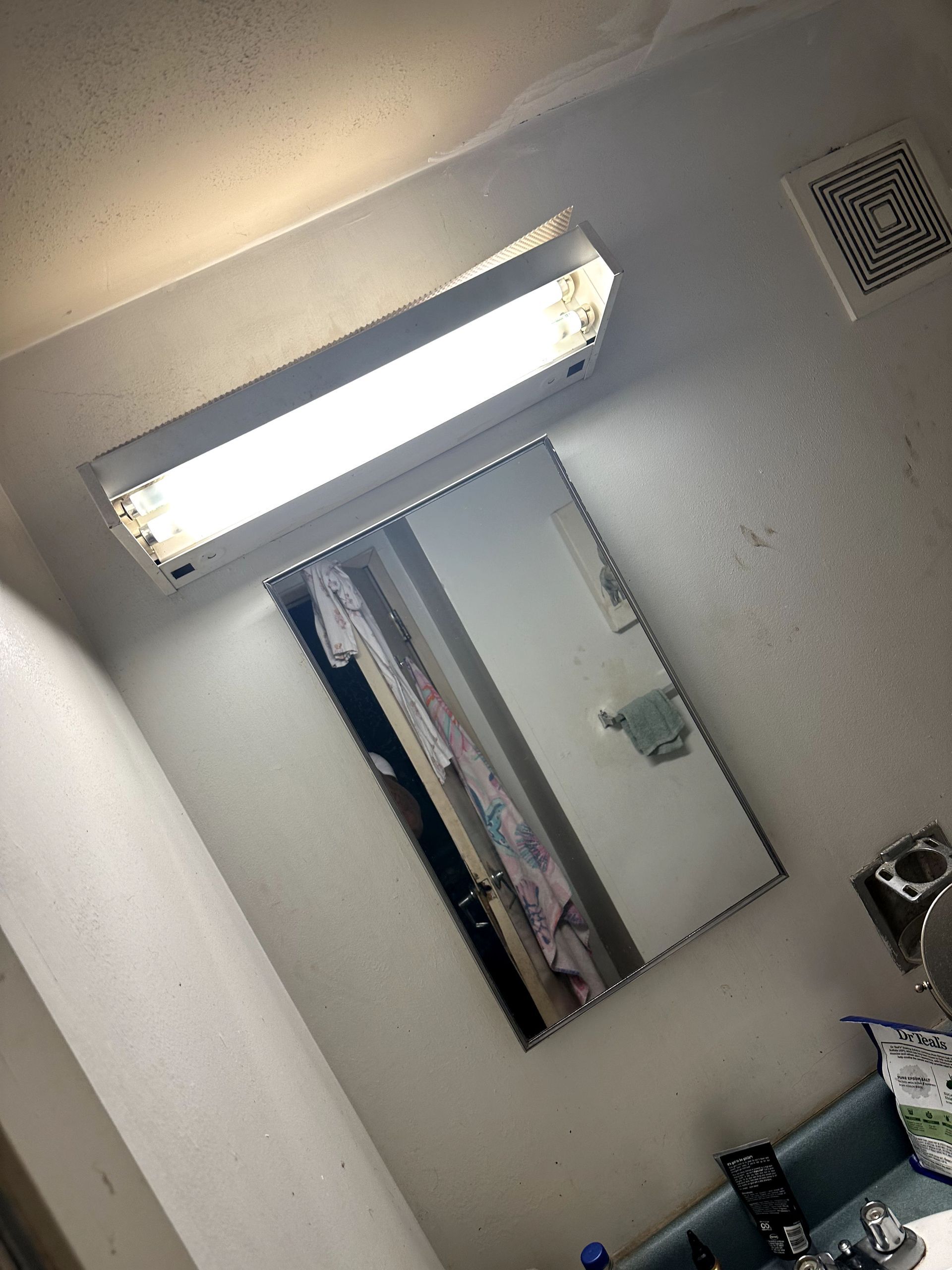 A during shot of a bathroom from a hoard cleanup in Pittsburgh, PA by Kingdom Bio Recovery & Restoration hard at work