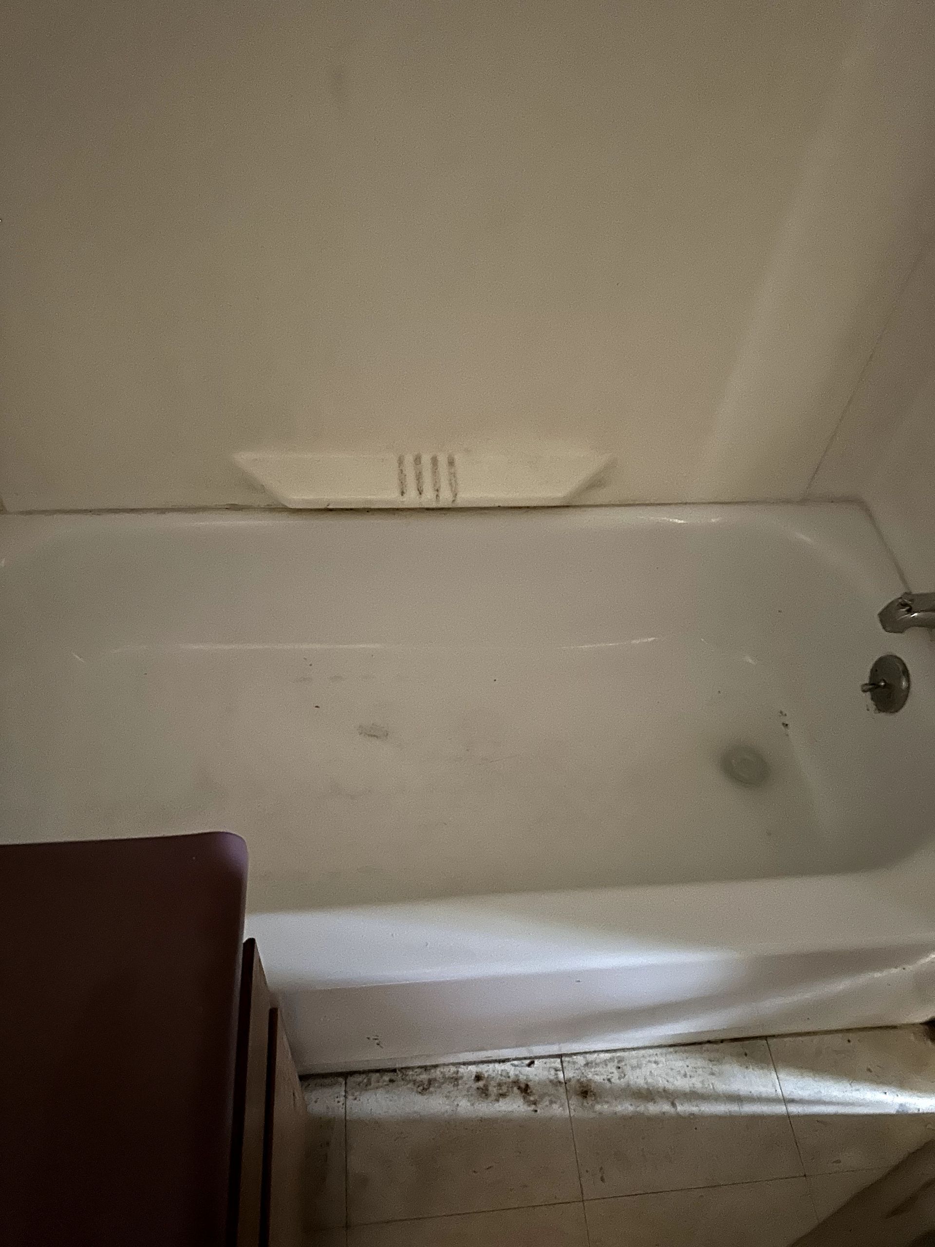 A during shot of a bathroom from a hoard cleanup in Pittsburgh, PA by Kingdom Bio Recovery & Restoration hard at work