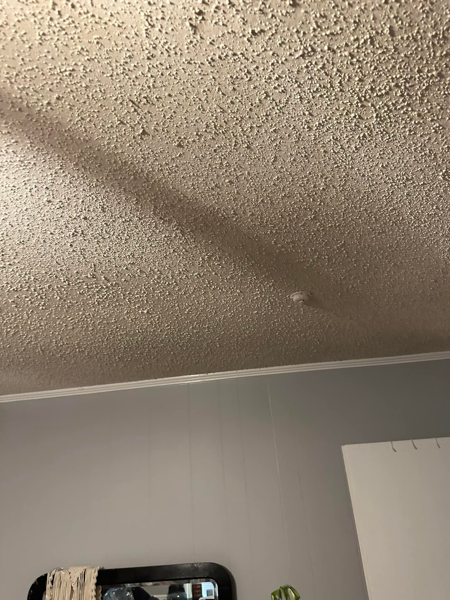 A room with a ceiling that has a lot of sparkles on it.