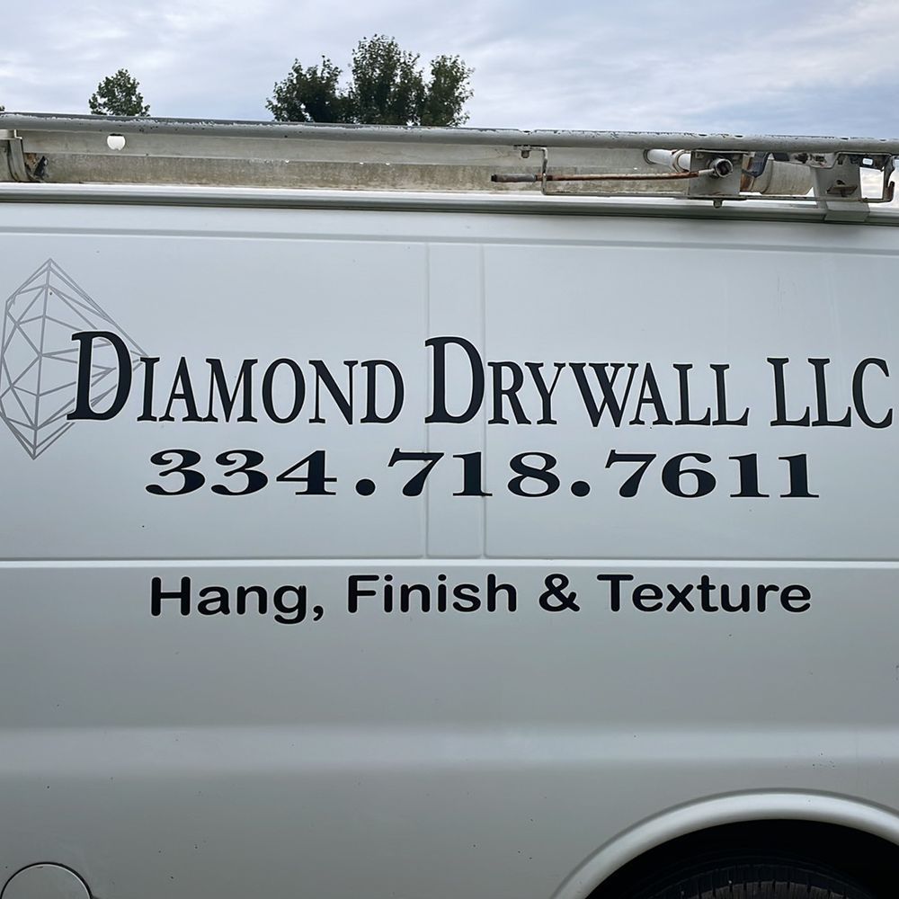 A diamond drywall llc van says hang finish and texture