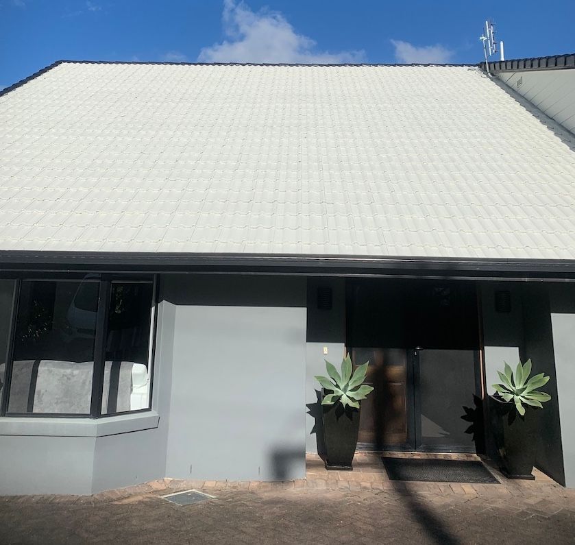 A White Roof After Cleaning— House & Roof Painting & Restorations In Maroochydore, QLD