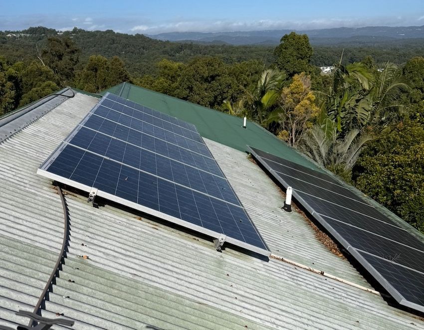 Cleaned And Painted Iron Roof With Solar Panels Before — House & Roof Painting & Restorations In Maroochydore, QLD