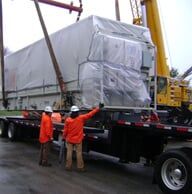 Men working with truck cargo — Construction Rentals in New Castle, Pennsylvania