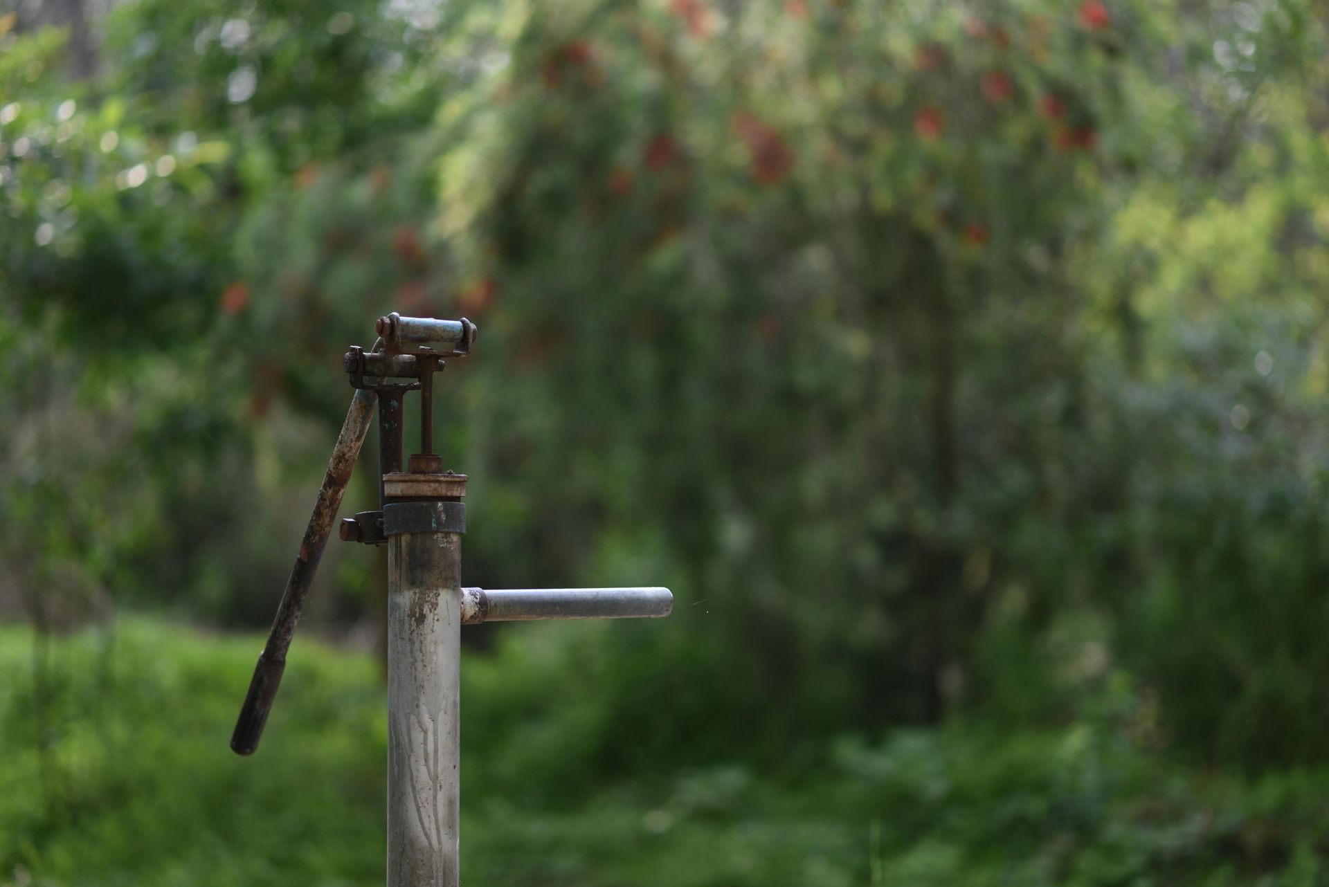 Windmill driven handpump for water in Montesano, WA