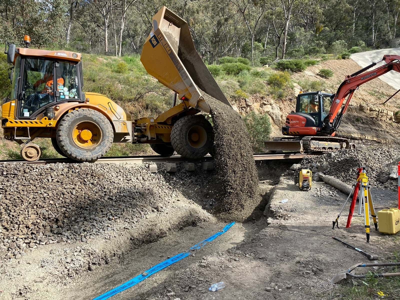 Backfilling for rail asset maintenance after installing new subsurface drainage in the rail corridor.
