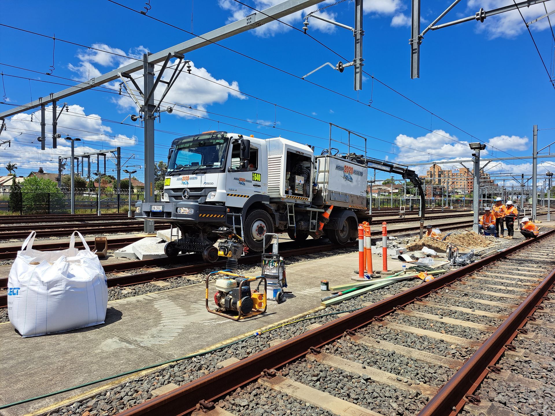 The Aqua Assets rail asset maintenance cleaning truck cleaning local railway tracks.