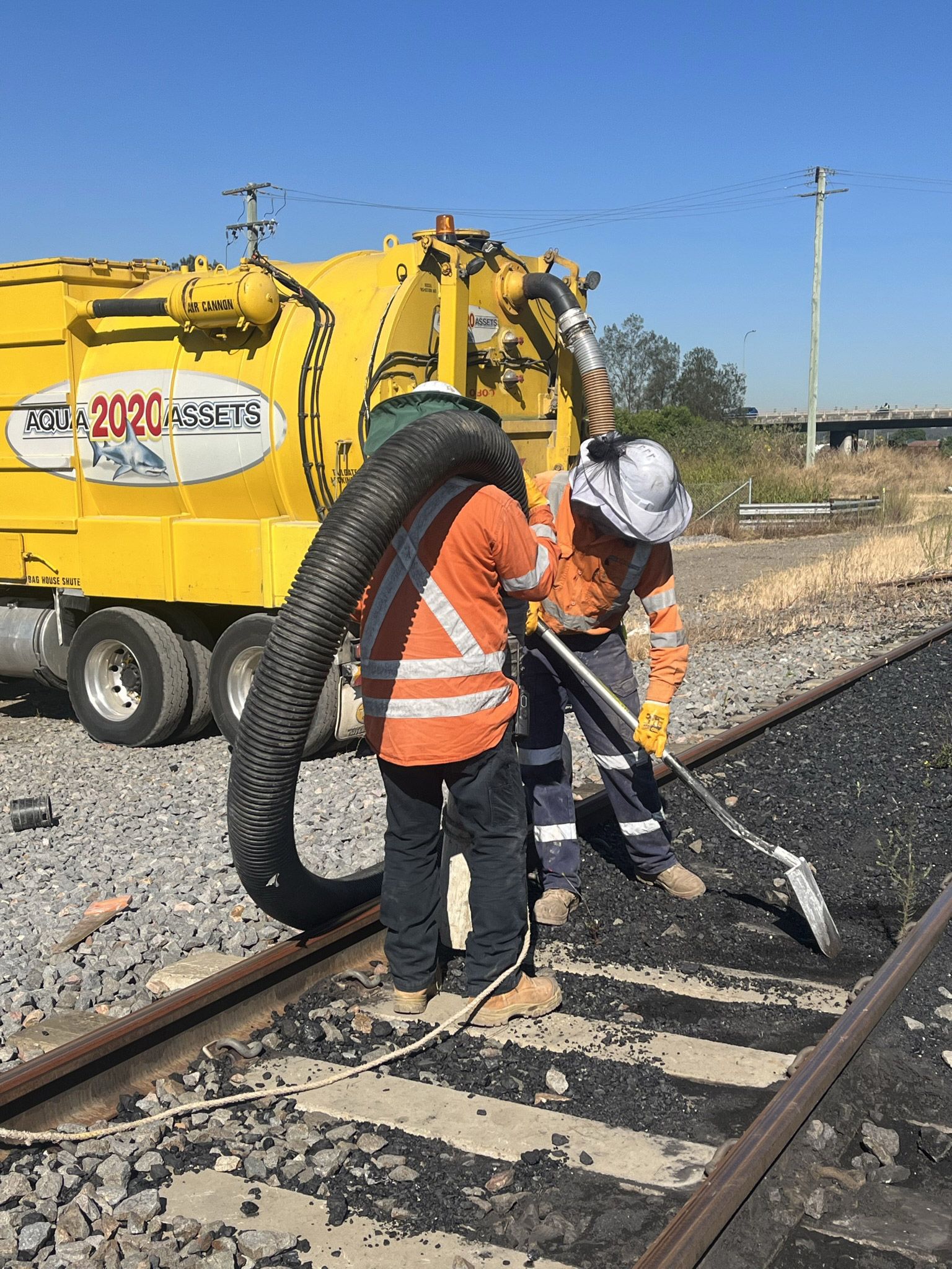 The Aqua Assets team vacuum loading a rail line.