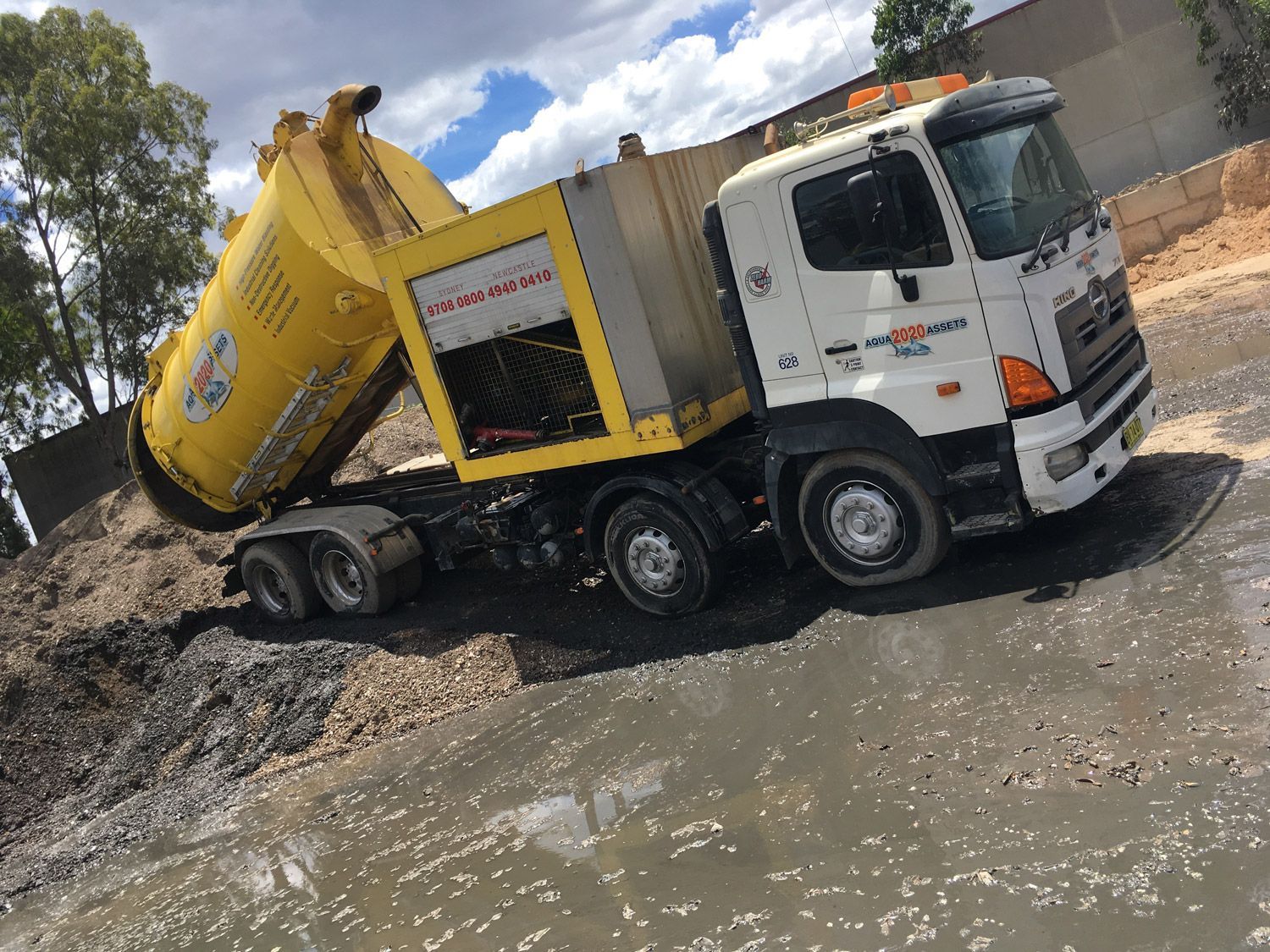 The Aqua Assets truck dumping vacuum load waste in an environmentally friendly capacity.