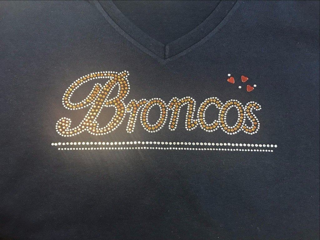 A black v-neck shirt featuring the word 