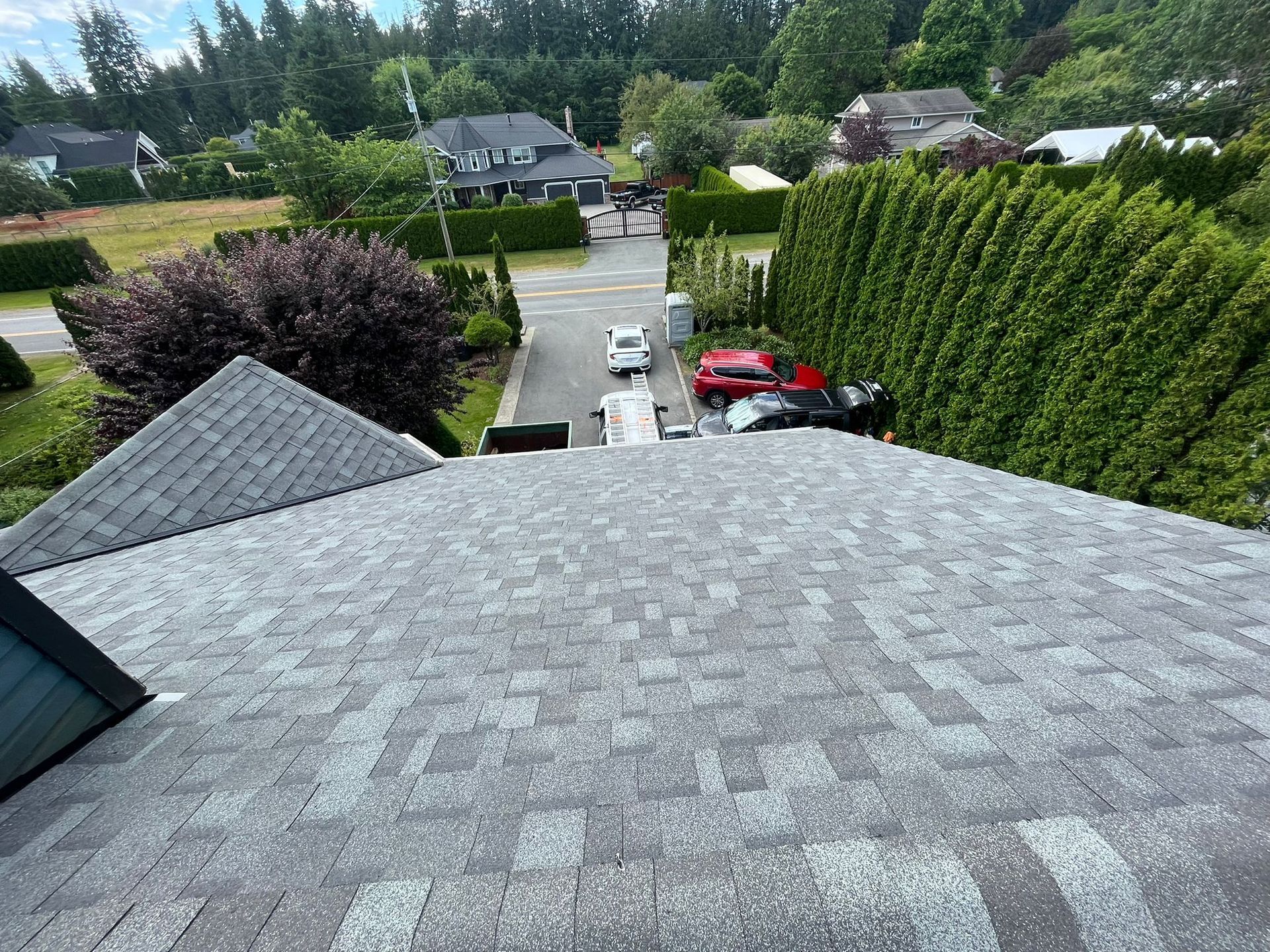A view of a roof from the top of a house.