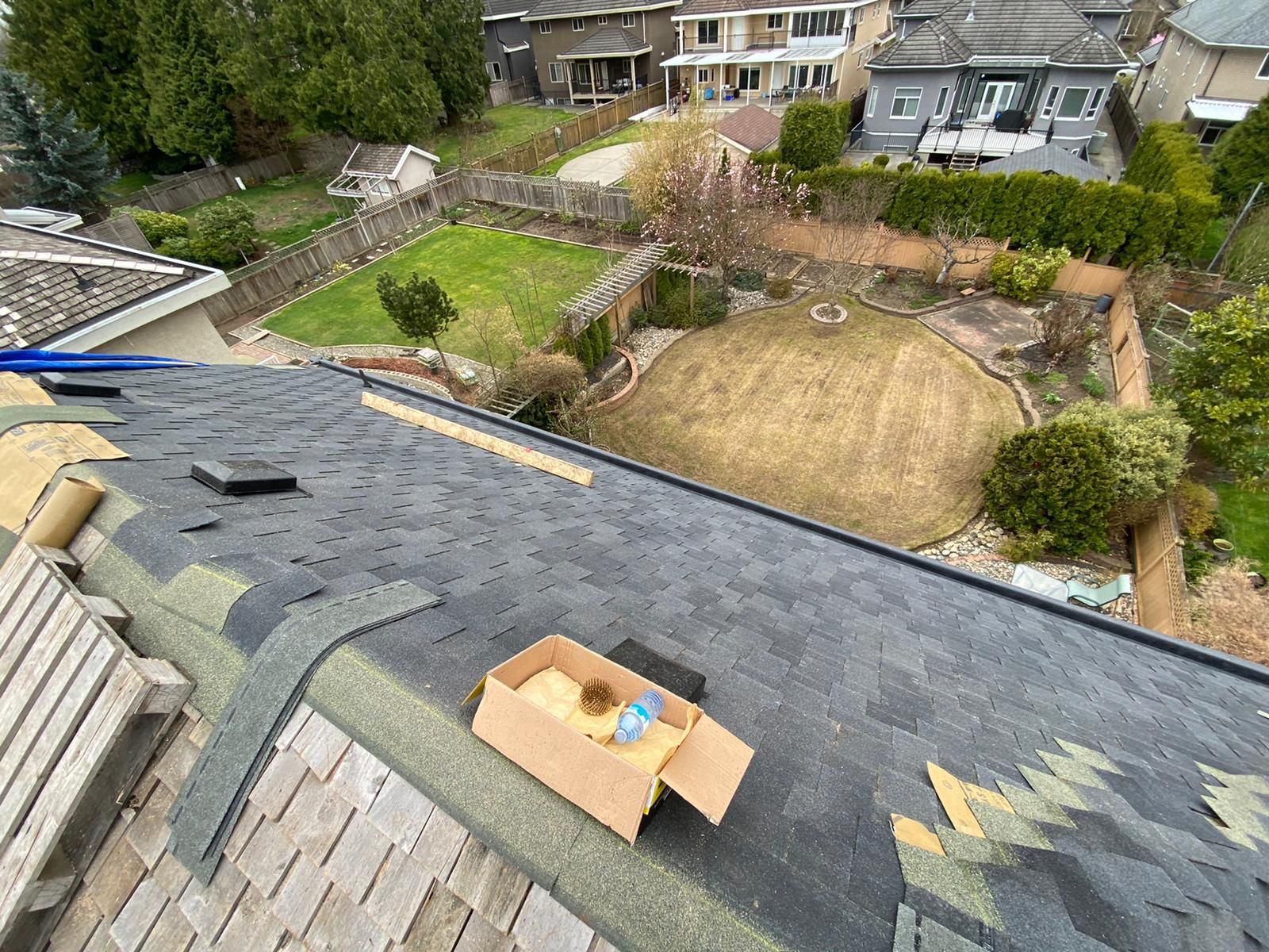 An aerial view of a roof with a box on top of it.
