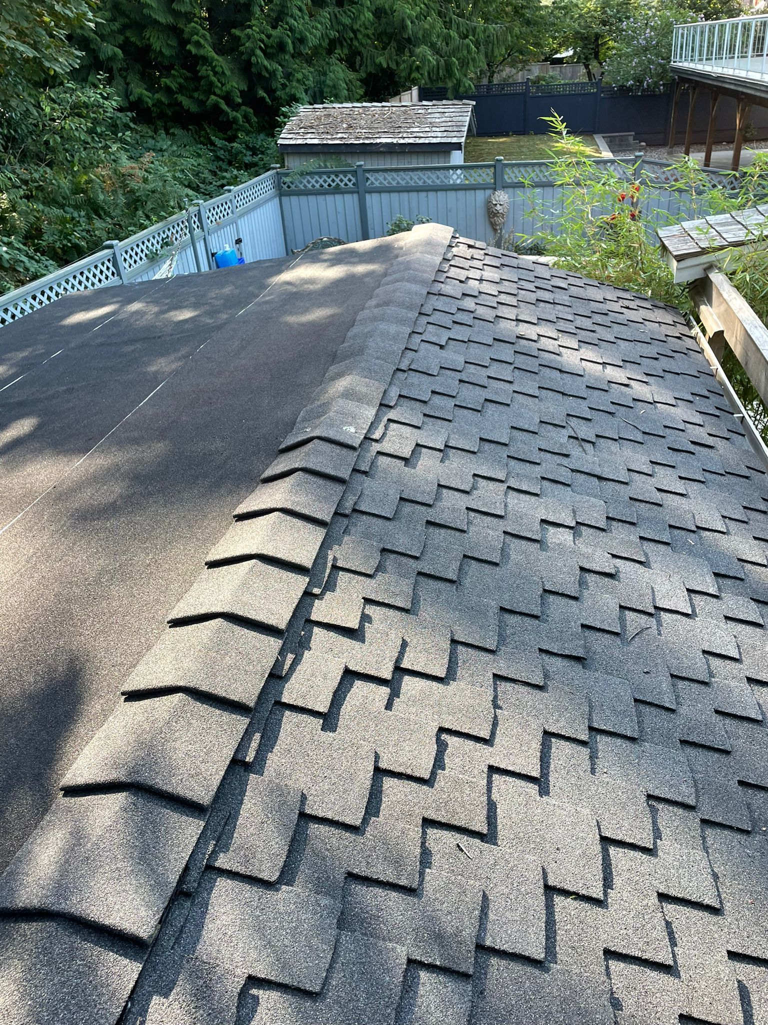 A close up of a roof with shingles on it.