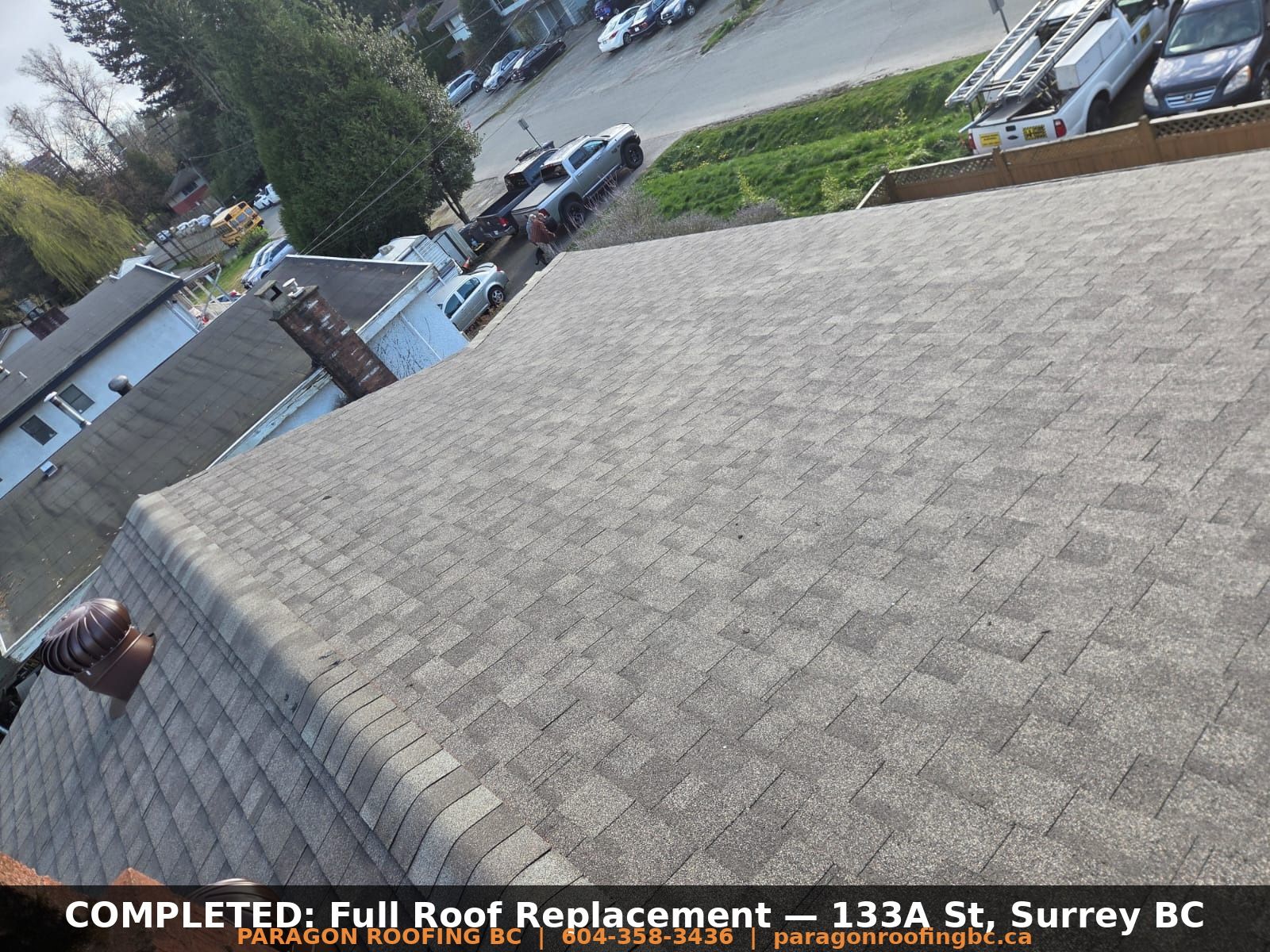 Completed full roof replacement with IKO architectural shingles — street view of 133A St & 108 Ave Surrey BC by Paragon Roofing BC