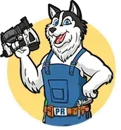 A husky dog in overalls is holding a camera.