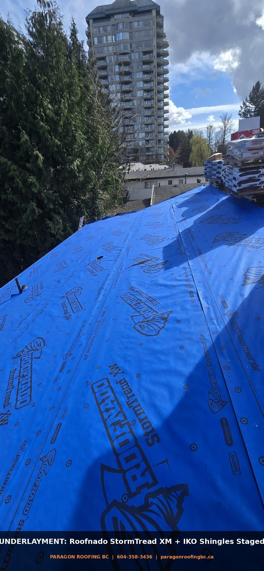 Roofnado StormTread XM synthetic underlayment installed with IKO architectural shingle bundles staged on roof — 133A St Surrey BC