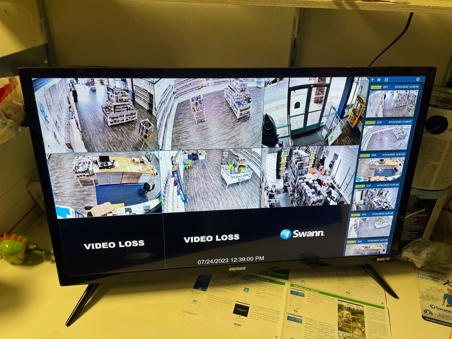 Security monitor showing multiple CCTV camera feeds in a video surveillance control room