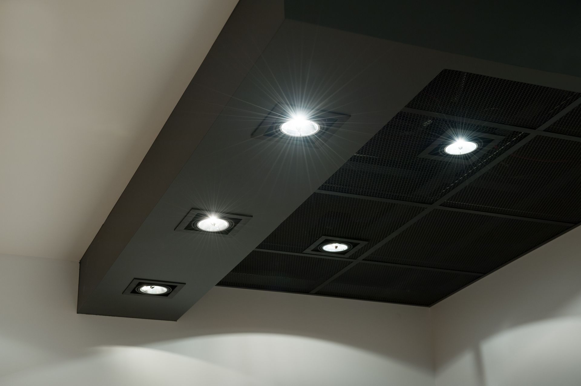 A ceiling with a lot of lights on it