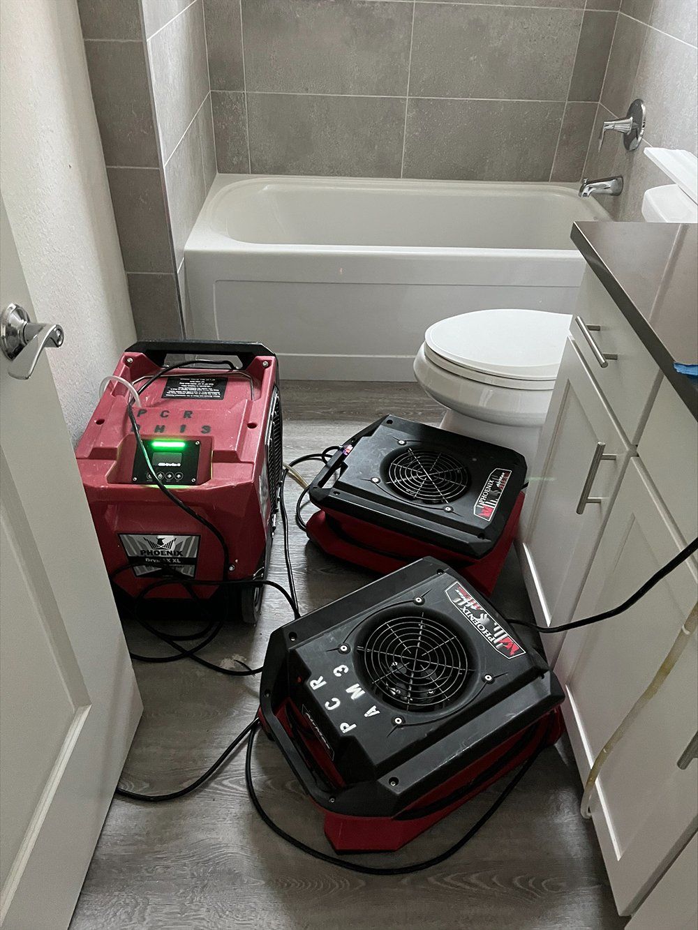 Removing Water in the Bathroom | Marco Island, FL | Paradise Coast Restoration