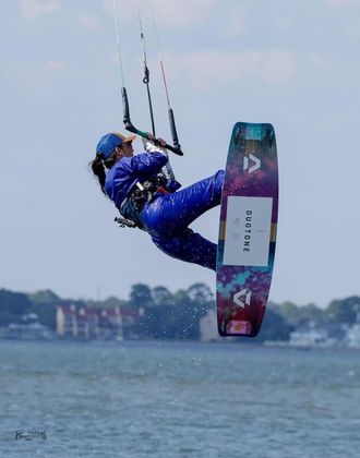 Jennifer backroll jumping Kitebarding