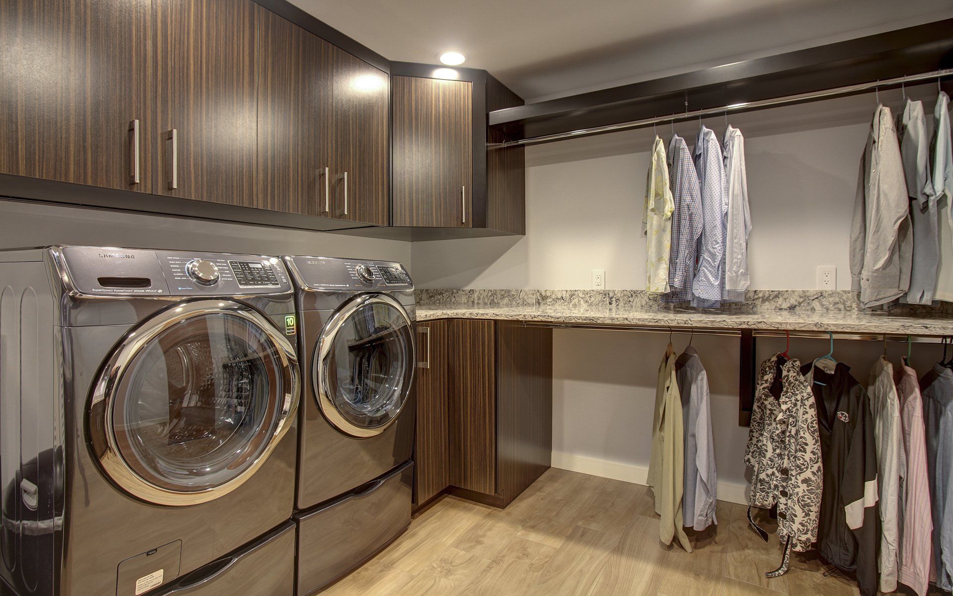 A laundry room with a washer and dryer in it