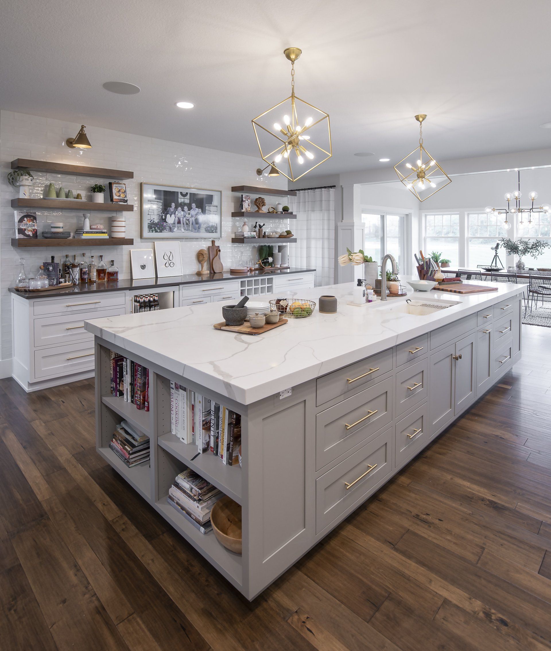 There is a large island in the middle of the kitchen.