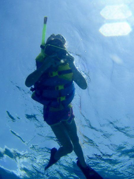 Bottom view of a child snorkeling