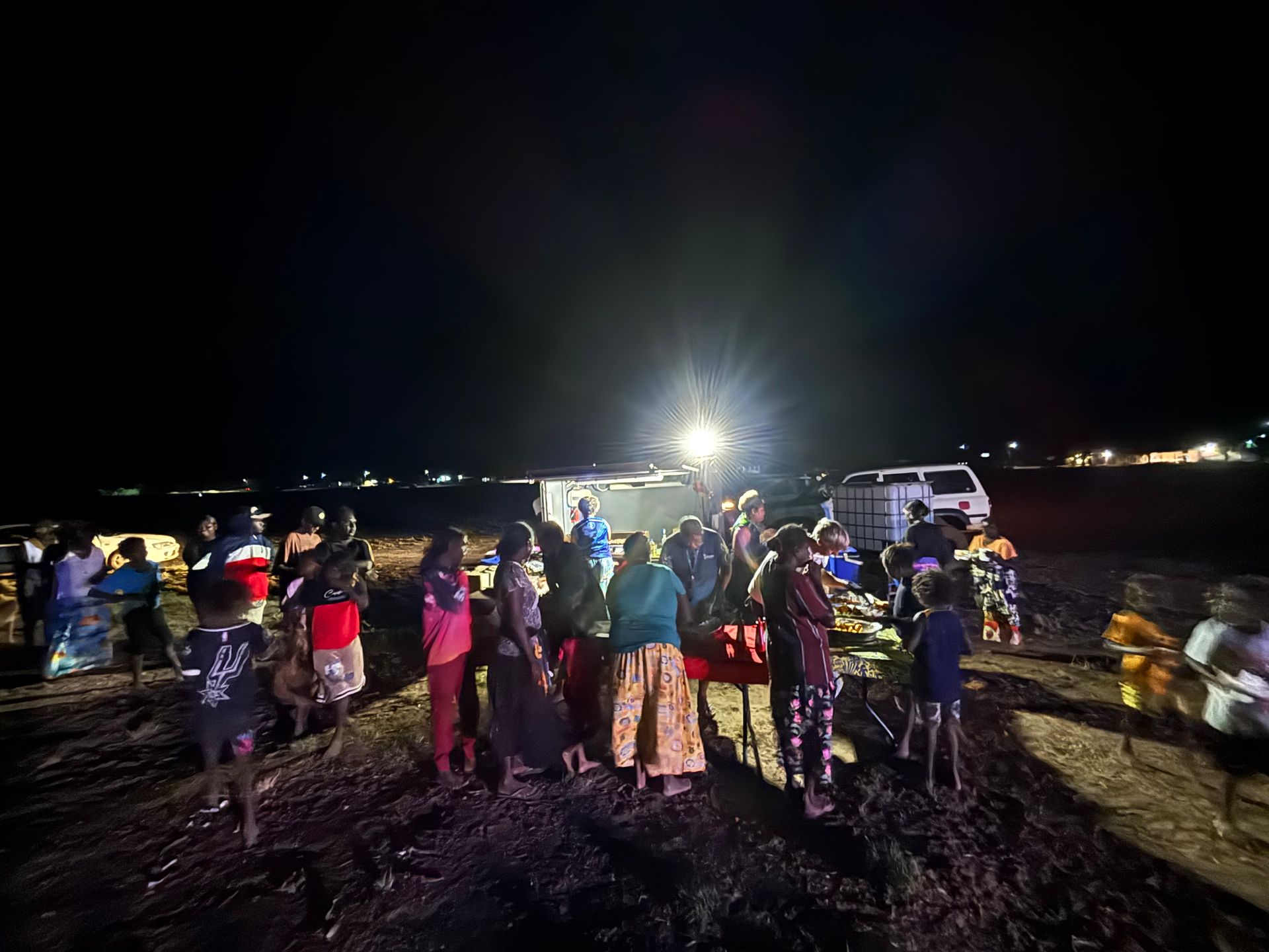 A group of people listening to music