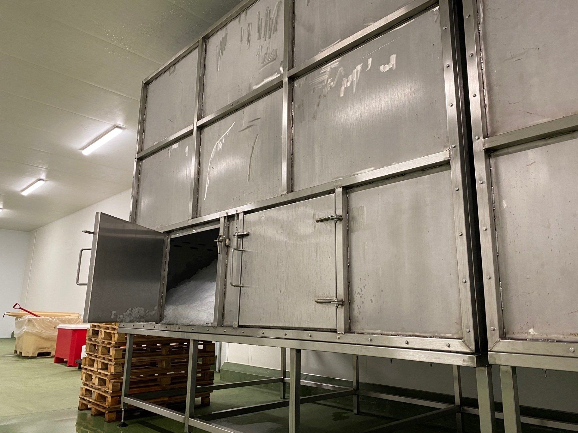 Large industrial processing equipment showing door open