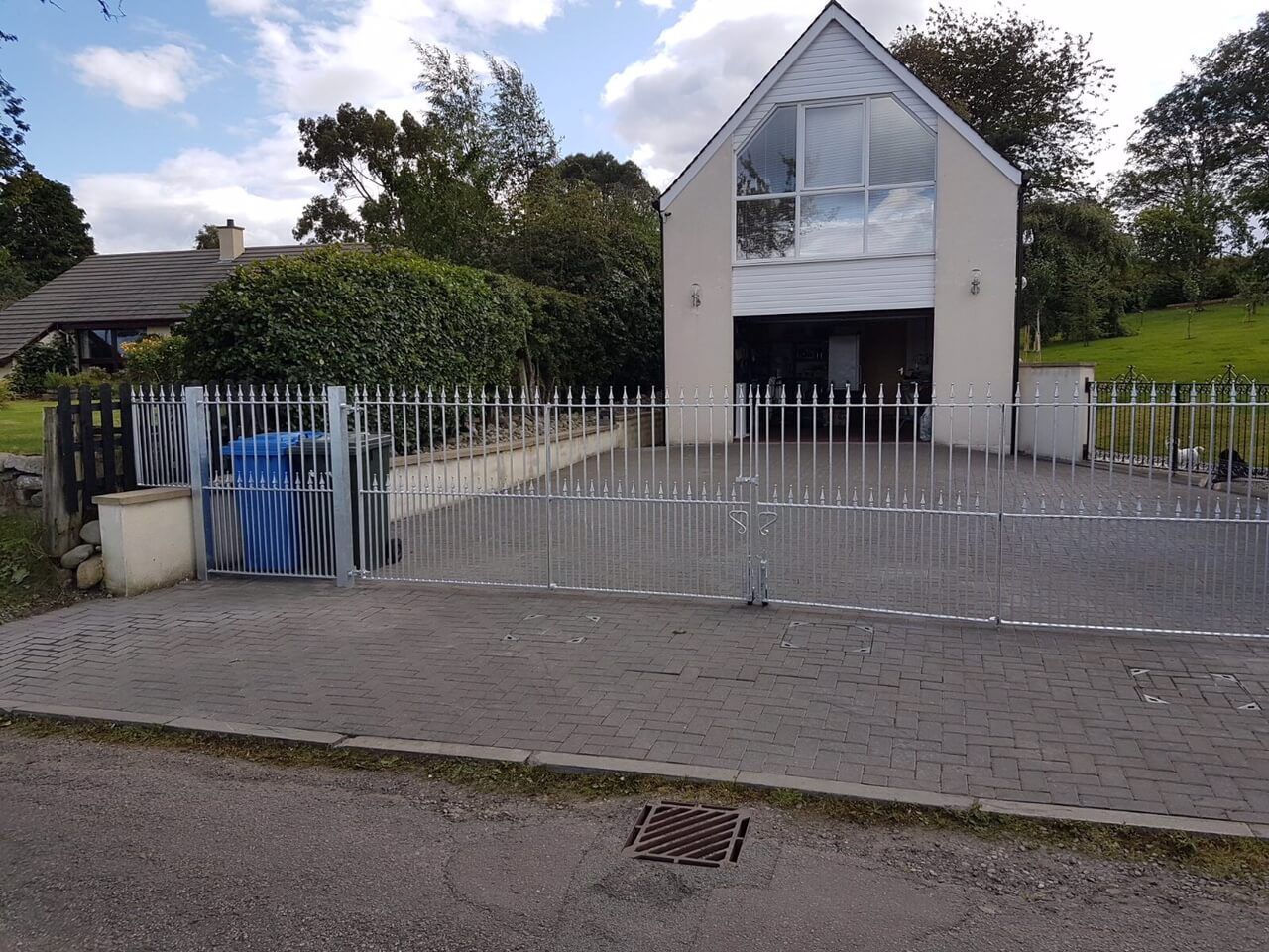 Large metal gates outside home