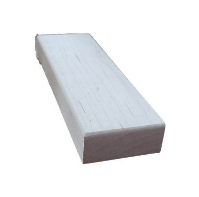 a white block is sitting on a white surface