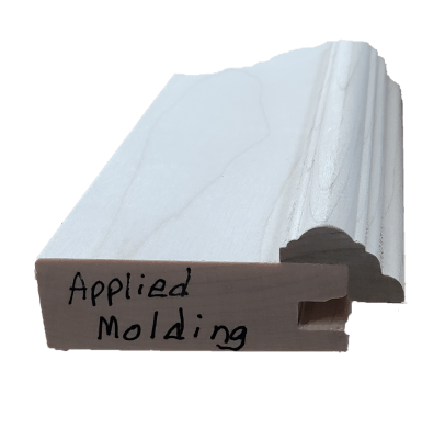 a piece of white molding with the words `` applied molding '' written on it .