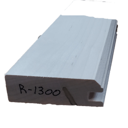 a white piece of wood with r-1300 written on it
