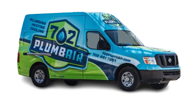 A blue and green van that says 702 plumber on it