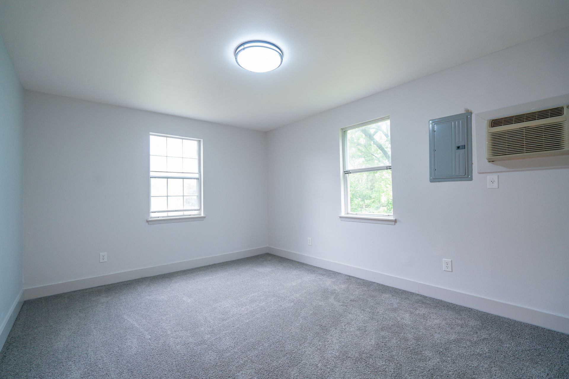 Photo of a large room with plenty of natural lighting