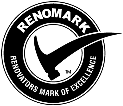A circular black and white RenoMark logo featuring a hammer shaped into a checkmark, with text around the perimeter.