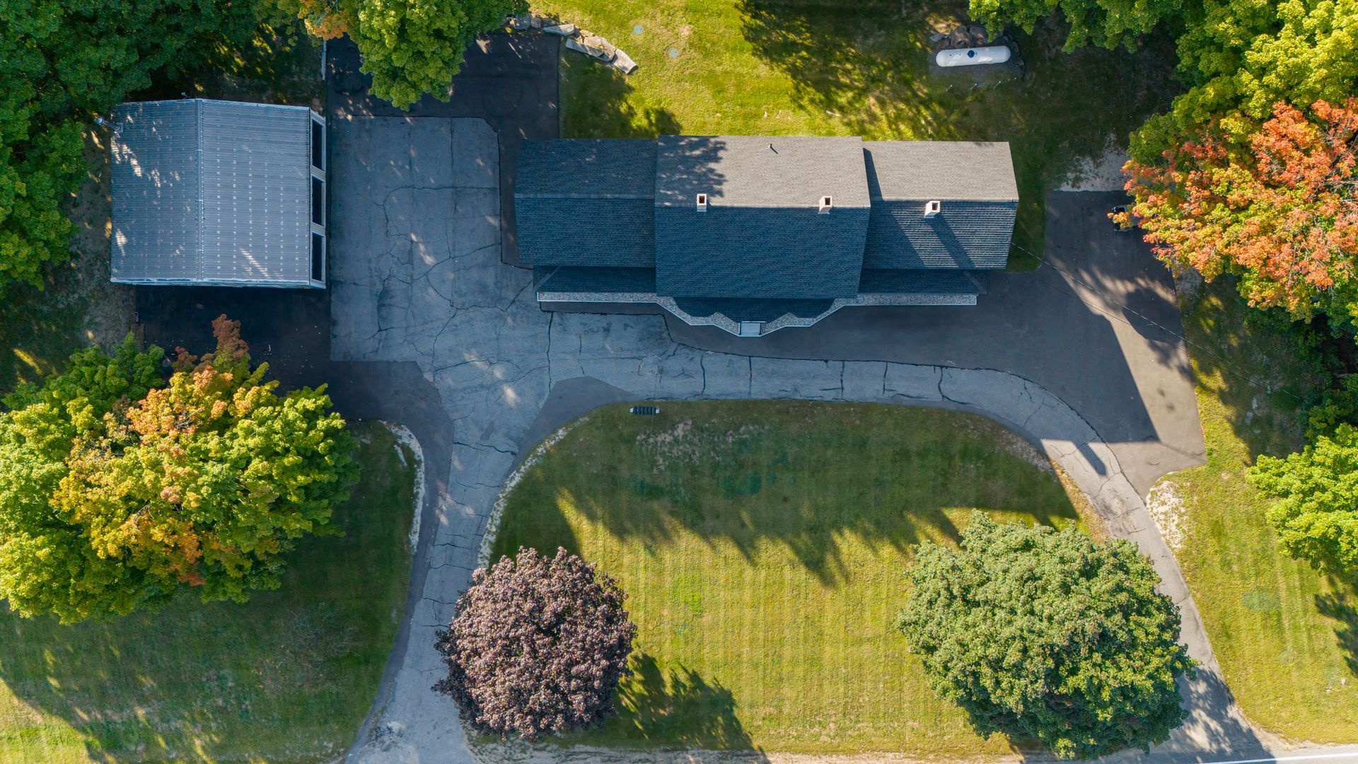 Aerial view photo of 166 Marsh Rd and driveway