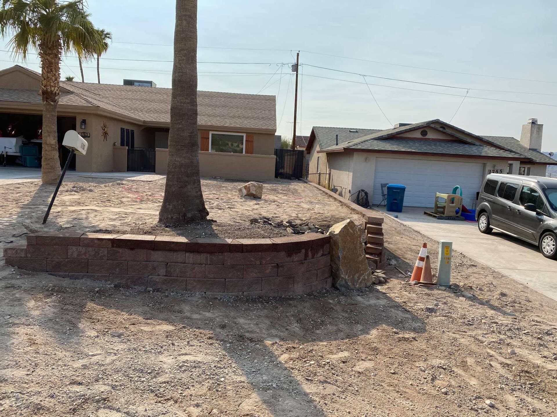 A house with a car parked in front of it
