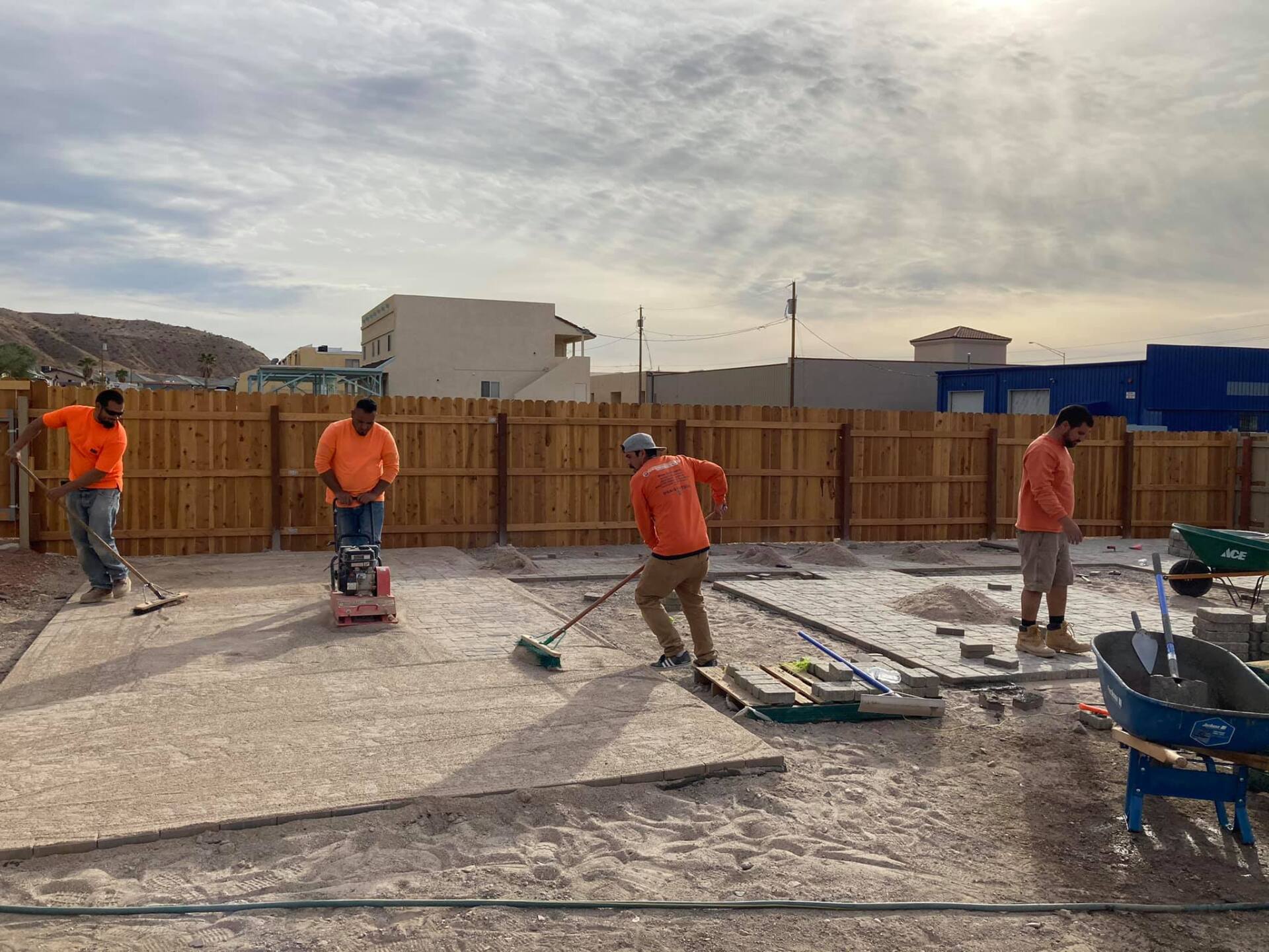 A group of construction workers are working on a construction site.