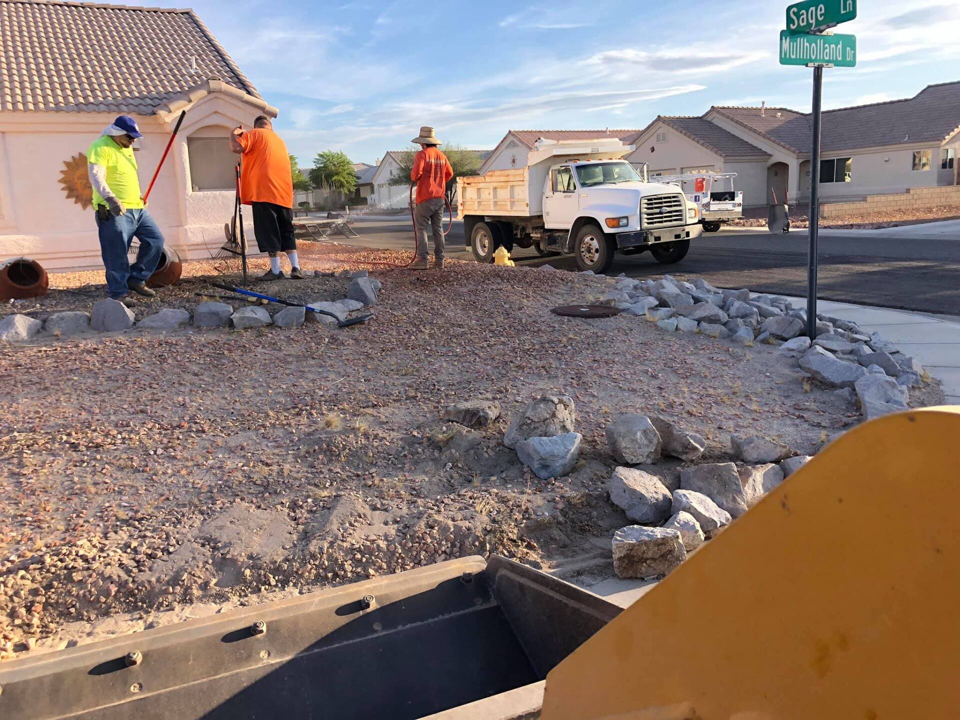 A group of construction workers are working on a construction site.