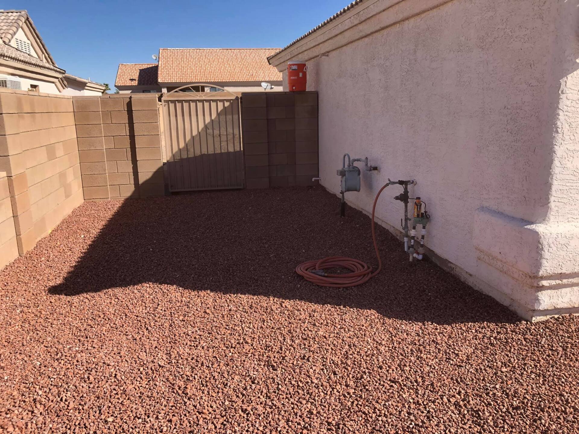 A hose is attached to the side of a house